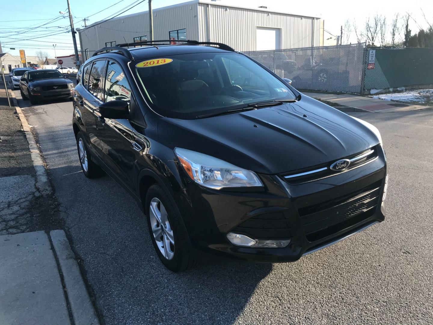 2013 Black /Black Ford Escape SE (1FMCU9G93DU) with an 2.0 V4 engine, Automatic transmission, located at 577 Chester Pike, Prospect Park, PA, 19076, (610) 237-1015, 39.886154, -75.302338 - Photo#3